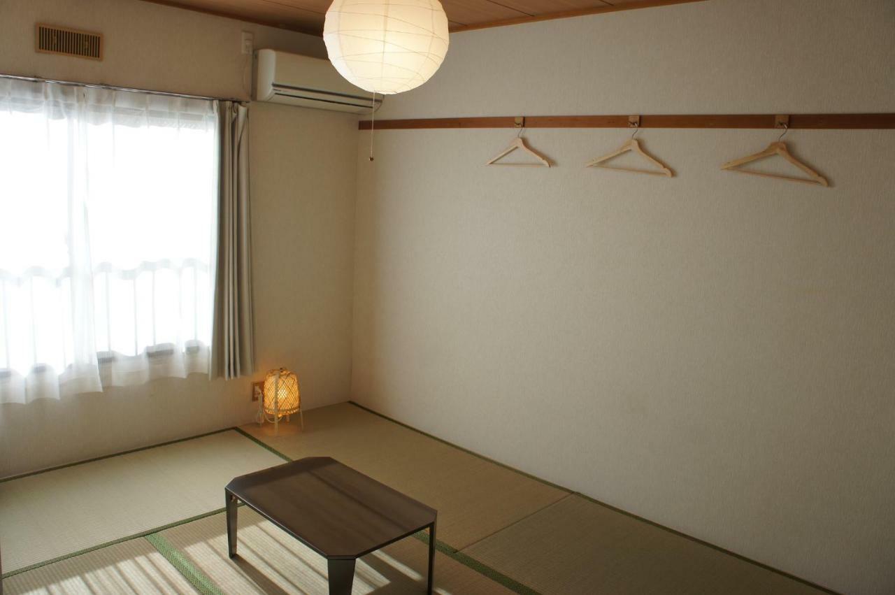 Guest House MEETS Okayama Bagian luar foto
