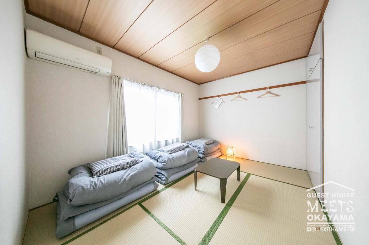 Guest House MEETS Okayama Bagian luar foto